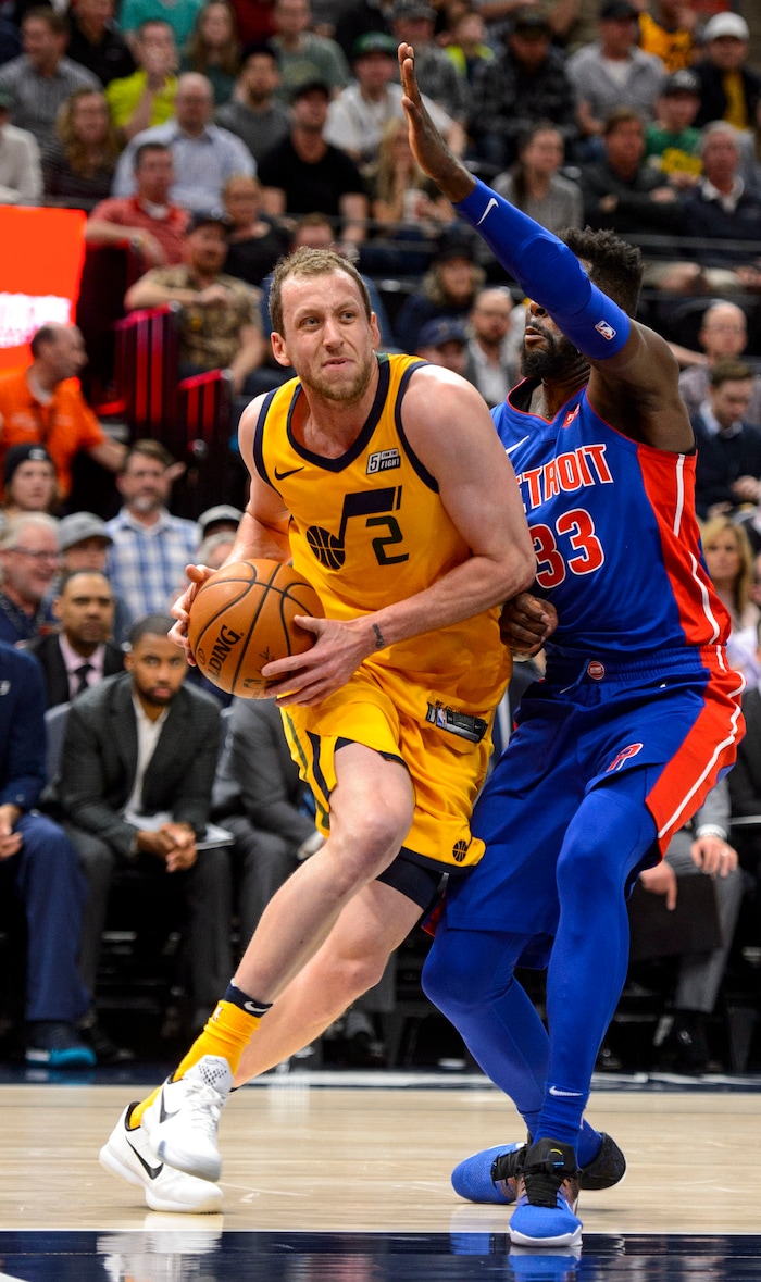 (Steve Griffin  |  The Salt Lake Tribune)  Utah Jazz forward Joe Ingles (2) drives around Detroit Pistons forward James Ennis III (33) during the Utah Jazz versus Detroit Pistons at Vivint Smart Home Arena in Salt Lake City Tuesday March 13, 2018.