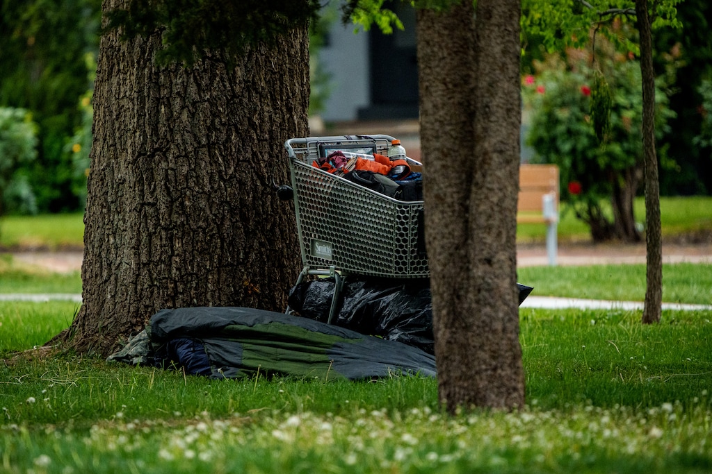 (Trent Nelson | The Salt Lake Tribune) A person and belongings in Liberty Park in Salt Lake City on Tuesday, May 13, 2025.