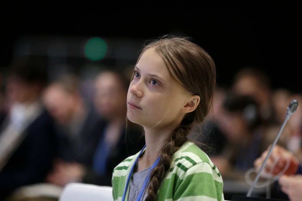 (Paul White | AP) Swedish climate activist Greta Thunberg listens to speeches before addressing a plenary of U.N. climate conference at the COP25 summit in Madrid, Spain, Wednesday, Dec. 11, 2019. Thunberg is in Madrid where a global U.N.-sponsored climate change conference is taking place. Thunberg was named Time’s youngest “person of the year” on Wednesday.