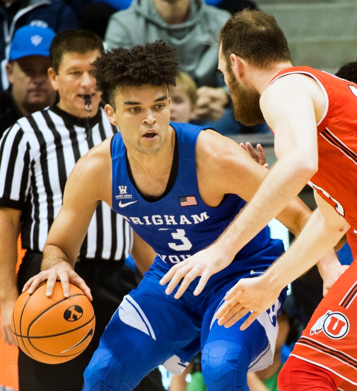 (Rick Egan  |  The Salt Lake Tribune)   Utah Utes forward David Collette (13) guards Brigham Young Cougars guard Elijah Bryant (3), in basketball action Utah Utes vs. Brigham Young Cougars at the Marriott Center in Provo, Saturday, December 15, 2017.


