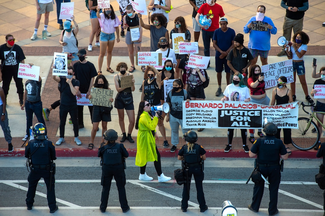 (Rick Egan  |  The Salt Lake Tribune) Sofia Alcala leads protesters in chants as they face off with the Salt Lake City Police, who threatened to arrest anyone who stepped off of the sidewalk during a Justice for Bernardo Palacios march in Salt Lake City on Tuesday, June 23, 2020.