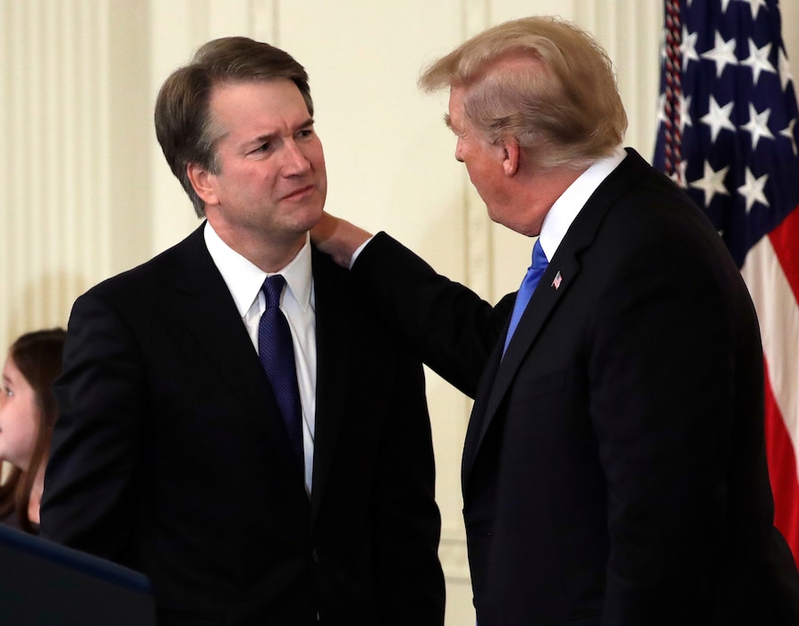 (AP Photo/Evan Vucci) President Donald Trump greets  Judge Brett Kavanaugh his Supreme Court nominee, in the East Room of the White House, Monday, July 9, 2018, in Washington.