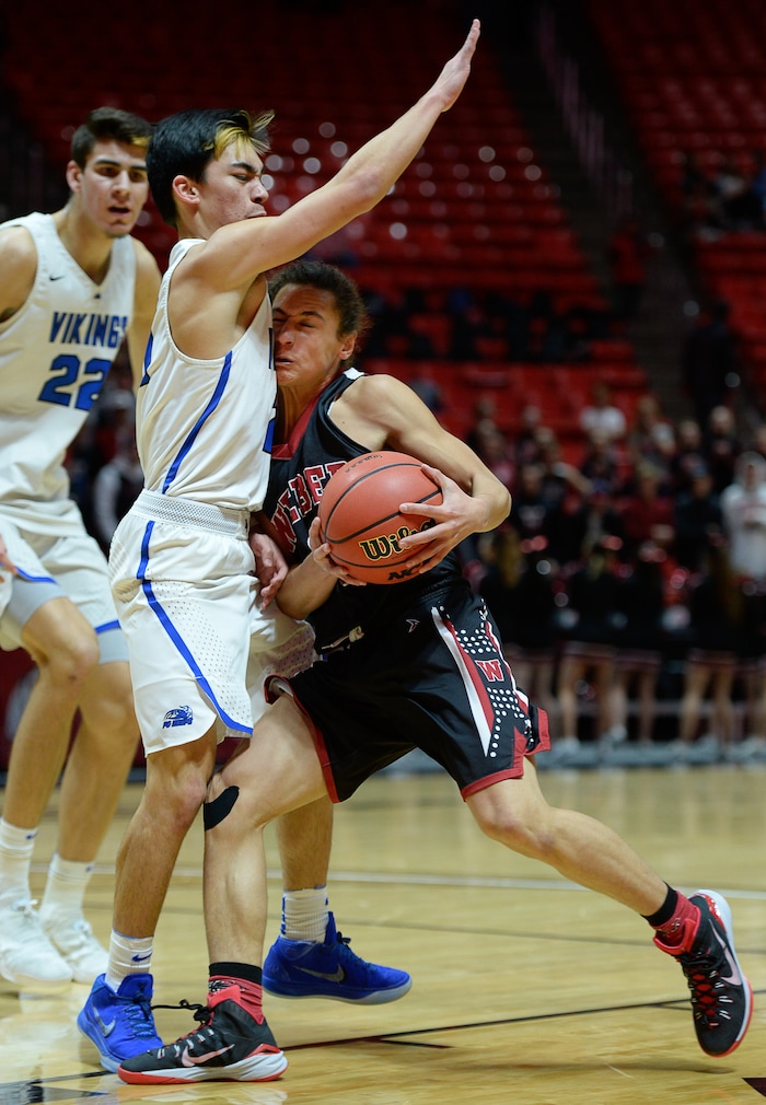(Francisco Kjolseth  |  The Salt Lake Tribune)  Weber vs Pleasant Grove, 6A State high school basketball tournament at the Huntsman Center in Salt Lake City, Thursday March 1, 2018. Pleasant Grove's Kawika Akina (21) puts the brakes on Hudson Schenck (3). 