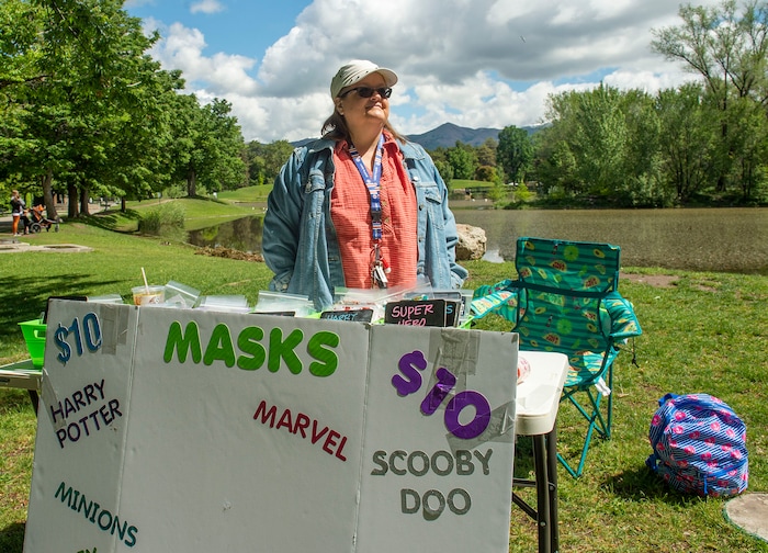 (Rick Egan  |  The Salt Lake Tribune)      Roberta Martinez sells masks at Liberty Park, although she doesn't believe in wearing them, Saturday, May 23, 2020.