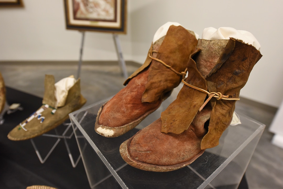 (Francisco Kjolseth  |  The Salt Lake Tribune)  A pair of moccasins believed to be Navajo or Apache are now part of the collections at the Natural History Museum of Utah. Many new cultural artifacts collected by famed explorer John Wesley Powell were discovered at Illinois State University by University of Utah Geology and Geophysics Professor Marjorie Chan who brought them to Utah recently. The artifacts will be displayed during a public event at the museum Saturday, Sept. 22, for one day only due to the delicate nature of the items.