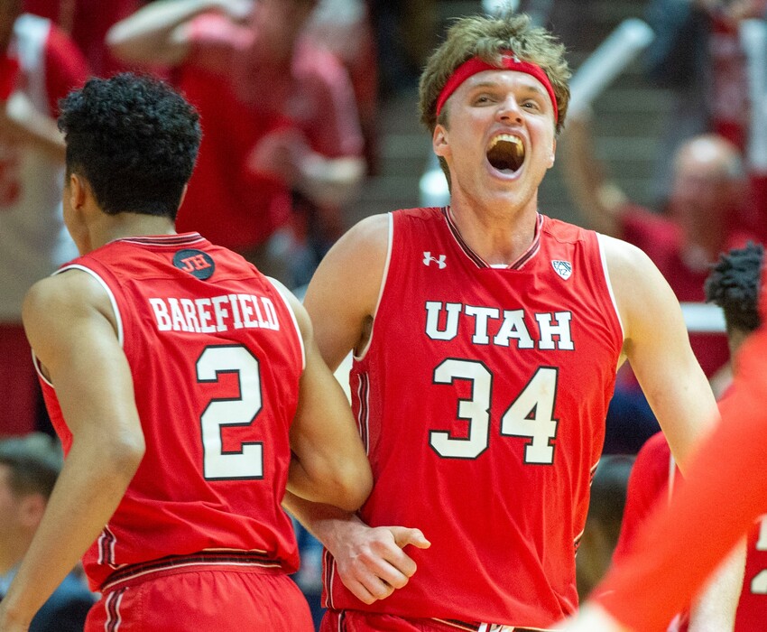 (Rick Egan | The Salt Lake Tribune)     Utah Utah Utes center Jayce Johnson (34) and Utah Utes guard Sedrick Barefield (2) celebrate as at the Utes call time out with a big lead late in the game, in PAC-12 action between Utah Utes and Arizona Wildcats at the Jon M. Huntsman Center, Thursday, Feb. 14. 2019