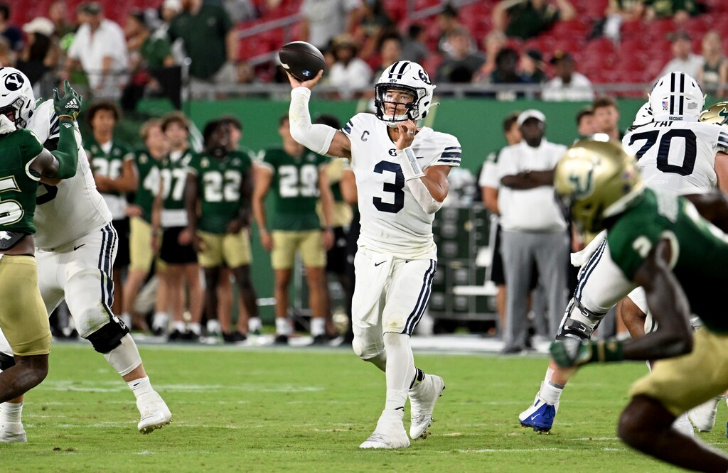 (Jason Behnken | AP) BYU quarterback Jaren Hall (3) throws pass during the second half of the team's NCAA college football game against South Florida on Saturday, Sept. 3, 2022, in Tampa, Fla.