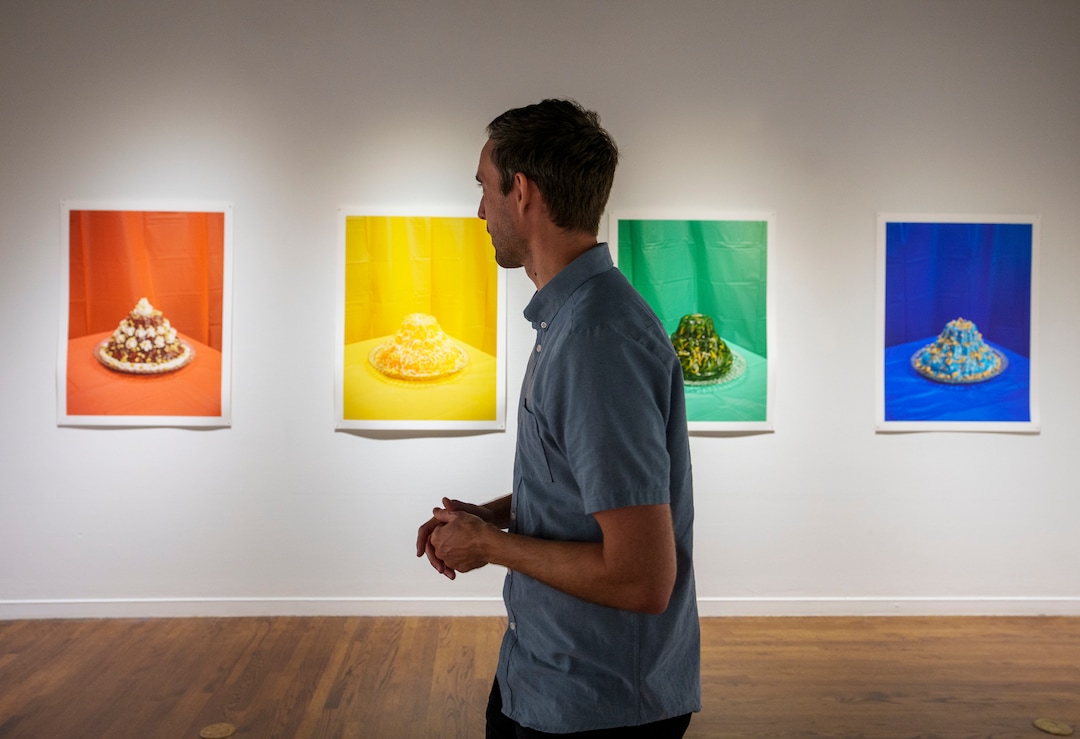 (Leah Hogsten | The Salt Lake Tribune) l-r Primary #2, (Salad), Primary #1 (Cinnamon Jello Salad), Primary #3 (Green Jello with Carrots) and Primary #4 (Jello Delight), Archival Pigment Prints, 2020, from "Marrow" a photo exhibit by Daniel George at The Utah Museum of Contemporary Art, Sept. 3 2021. George examines the culinary and cultural heritage of members of The Church of Jesus Christ of Latter-day Saints, Sept. 3 2021. George recreated and photographed dishes from Ward Cookbooks, including Funeral Potatoes, Casseroles, Jello creations, turning food into folk art.