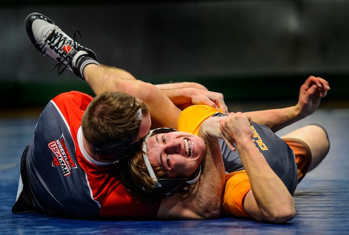 (Steve Griffin  |  The Salt Lake Tribune) Brad Lowery, of Canyon View, right, struggles to escape the hold of Brock Hardy, of Box Elder, during the Utah Allstar Dual wrestling at Utah Valley University's UCCU Center in Orem Tuesday January 9, 2018.