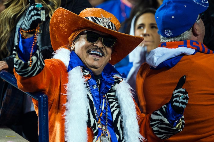 (Chris Detrick  |  The Salt Lake Tribune)  A Boise State Broncos fan cheers after a touchdown during the game LaVell Edwards Stadium Friday, October 6, 2017. 