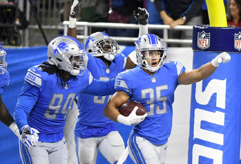 Detroit Lions strong safety Miles Killebrew (35) celebrates his 35-yard interception for a touchdown against the Arizona Cardinals during an NFL football game in Detroit, Sunday, Sept. 10, 2017. Detroit won 35-23. AP Photo | Jose Juarez.