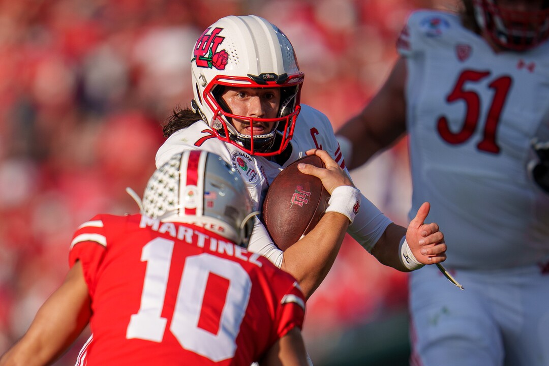 (Trent Nelson  |  The Salt Lake Tribune) Utah Utes quarterback Cameron Rising (7) runs the ball as the Utah Utes face the Ohio State Buckeyes at the Rose Bowl in Pasadena, Calif., on Saturday, Jan. 1, 2022.