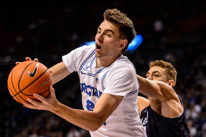 (Trent Nelson | The Salt Lake Tribune)   Brigham Young Cougars guard Zac Seljaas (2) pulls down a rebound as BYU hosts San Diego, NCAA basketball in Provo Saturday January 20, 2018.