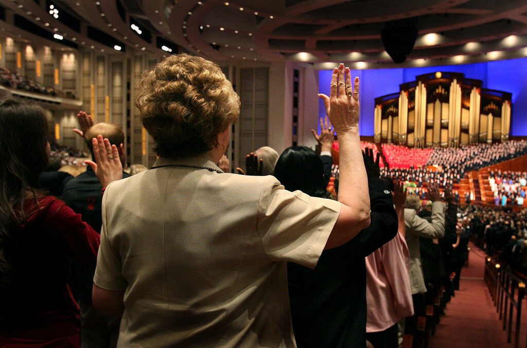 (Scott Sommerdorf  |  The Salt Lake Tribune) Members of the Relief Society stand to sustain top church leadership on April 5, 2008.