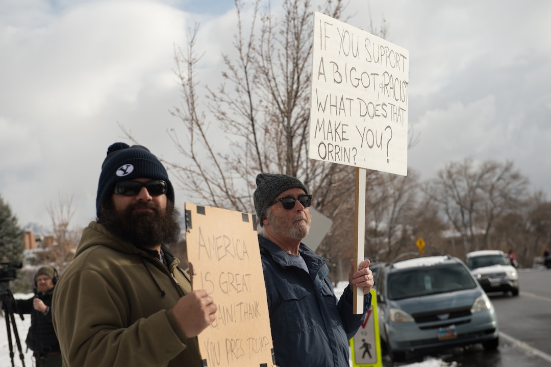 (Rachel Molenda  |  The Salt Lake Tribune)  Jason Lutu, left, of Lehi, and Donald Tarter, right, of Salt Lake City, gatherd in front of the capitol building in Salt Lake City, Utah, on Monday, December 4, 2017. Lutu said he was there supporting President Donald Trump's plan to shrink Bears Ears and Grand Staircase Escalante, while Tarter said he is against the plan.