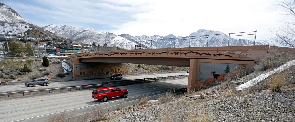 Vehicles pass under a bridge at I-215 at 3300 south Friday, March 16, 2018, in Salt Lake City. Utah is the nation's biggest proponents and user of the bridge construction method that was used in the Florida bridge that collapsed this week. Utah Department of Transportation's chief structural engineer Carmen Swanwick said that more than 200 bridges in the state in the last decade have been built using the accelerated bridge construction method, or ABC. (AP Photo/Rick Bowmer)