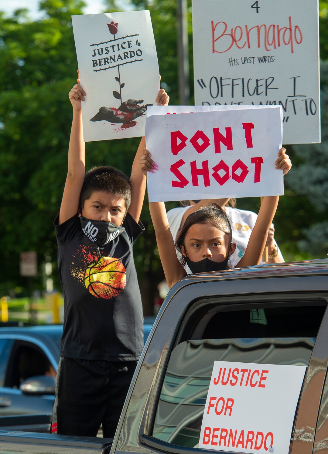 (Rick Egan  |  The Salt Lake Tribune)    Anthony and Adriana Palacios, hold signs as they join protesters at the Salt Lake Public Safety Building during a Justice for Bernardo protest on Wednesday, June 24, 2020.
