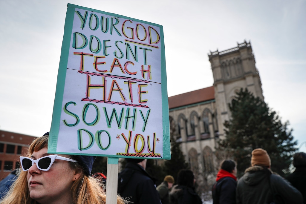 (John Minchillo | AP Photo) Protestors gather outside the Catholic Diocese of Covington Tuesday, Jan. 22, 2019, in Covington, Ky. The diocese in Kentucky has apologized after videos emerged showing students from Covington Catholic High School mocking Native Americans outside the Lincoln Memorial on Friday after a rally in Washington.