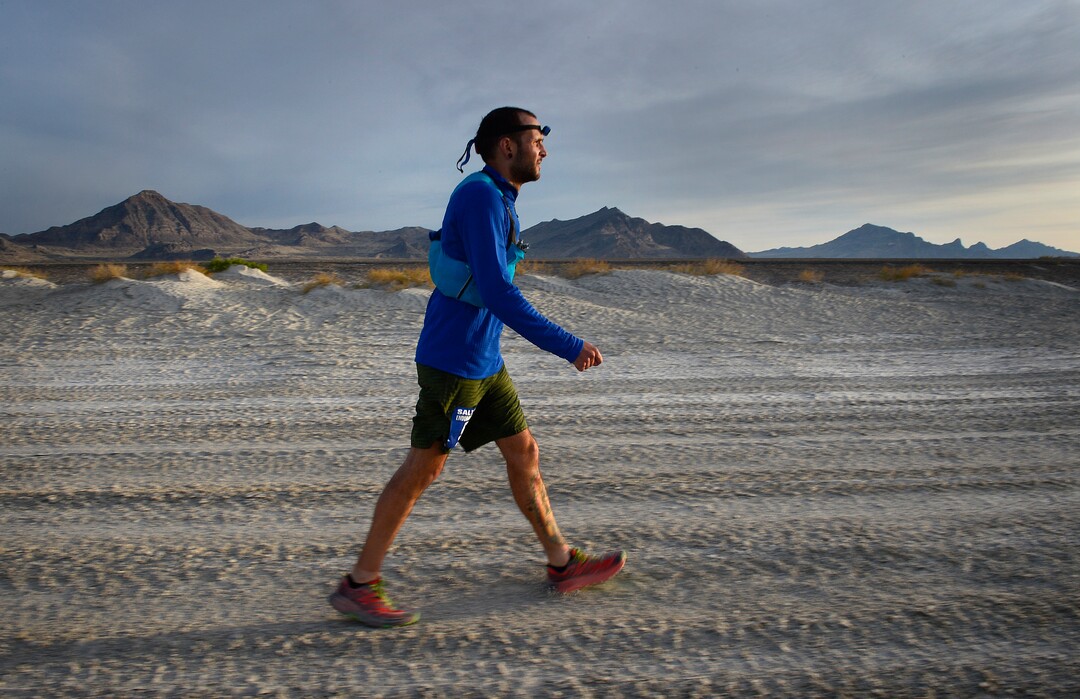 (Scott Sommerdorf | The Salt Lake Tribune)Alex Doolan walks the last mile of the Salt Flats 100 Endurance Run, Saturday, May 5, 2018.
