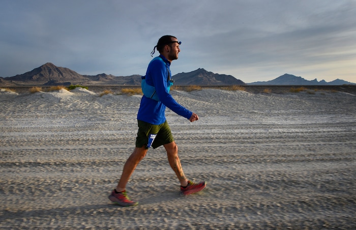 (Scott Sommerdorf | The Salt Lake Tribune)
Alex Doolan walks the last mile of the Salt Flats 100 Endurance Run, Saturday, May 5, 2018.

