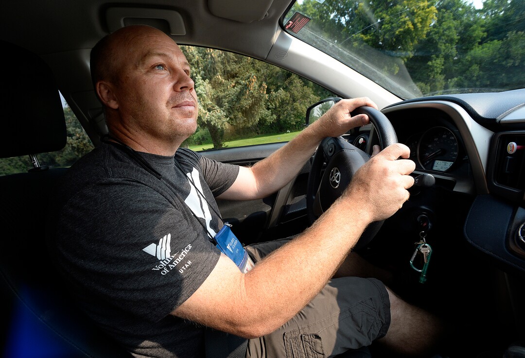 (Scott Sommerdorf   |  The Salt Lake Tribune)   Sean Spalding, of the Volunteers of America, drives through Sugarhouse Park looking for homeless people to see if they were in need of some help, Wednesday, September 6, 2017.