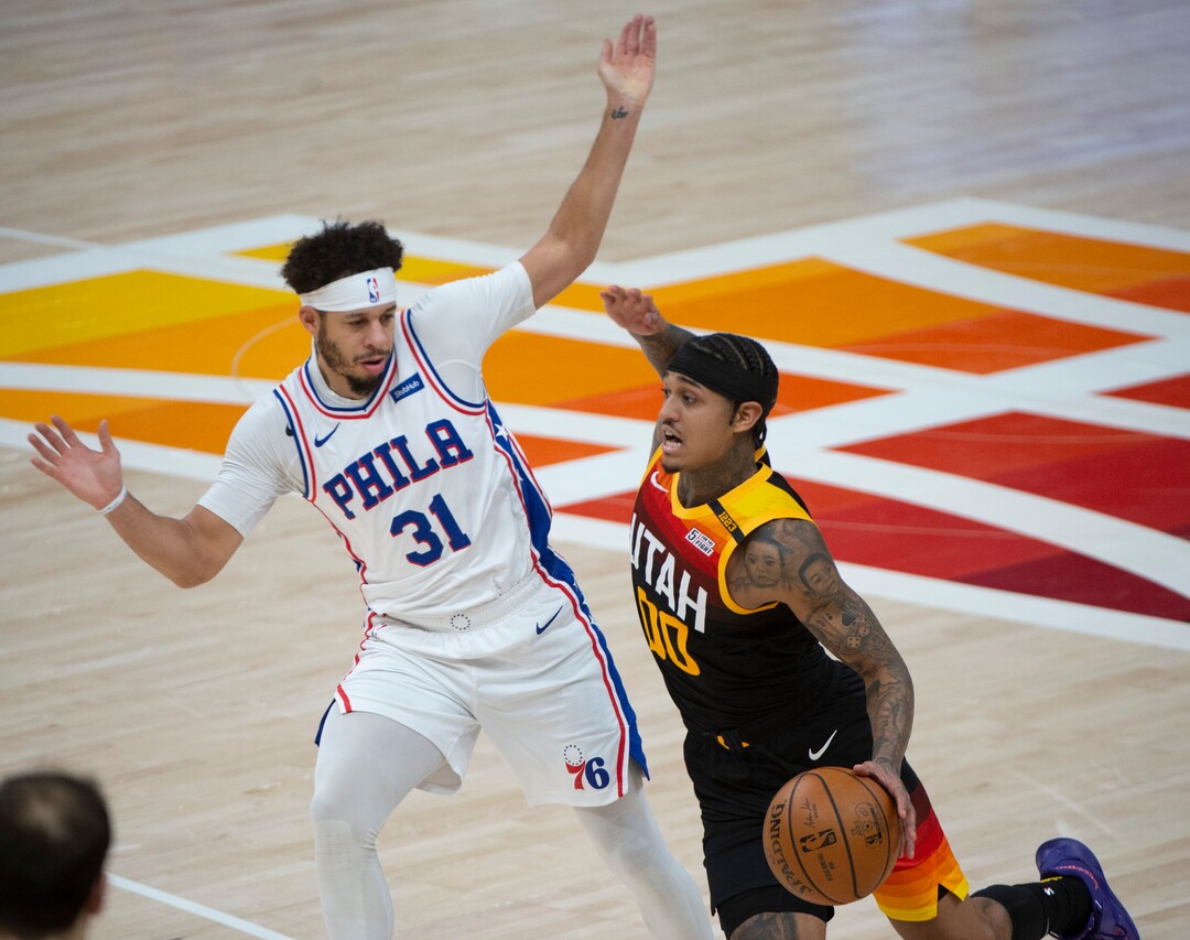 (Rick Egan | The Salt Lake Tribune)Utah Jazz guard Jordan Clarkson (00) gets past Philadelphia 76ers guard Seth Curry (31), in NBA action between the Utah Jazz and the Philadelphia 76ers at Vivint Arena, on Monday, Feb. 15, 2021.