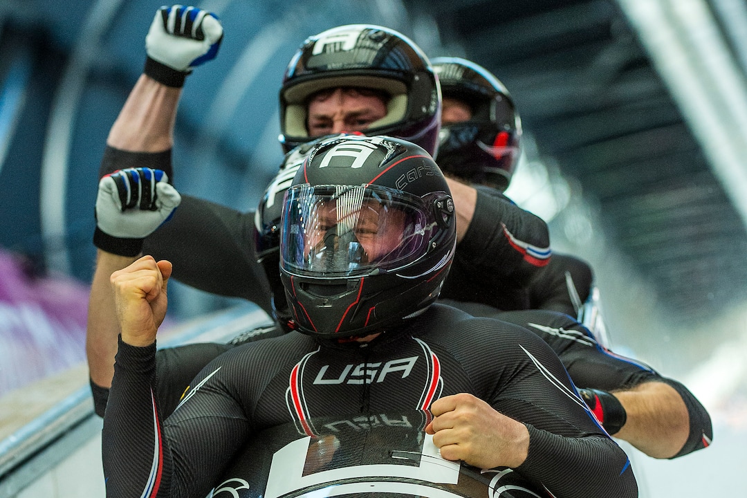 KRASNAYA POLYANA, RUSSIA  - JANUARY 23:Night Train 2, piloted by Steven Holcomb and pushed by Chris Fogt, Curtis Tomasevicz, Steve Langton, celebrate at the finish of the four-man bobsled at Sanki Sliding Center during the 2014 Sochi Olympics Sunday February 23, 2014. The team won the bronze medal with a cumulative time of 3:40.99. (Photo by Chris Detrick/The Salt Lake Tribune)