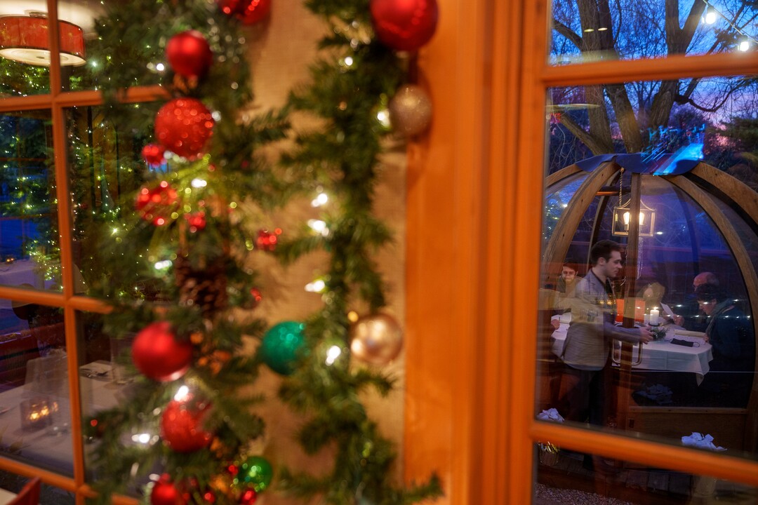 (Trent Nelson  |  The Salt Lake Tribune) Christmas decorations at Franck's Restaurant in Holladay on Saturday, Dec. 4, 2021. Outside the restaurant is an Alpenglobe, a dining shelter.
