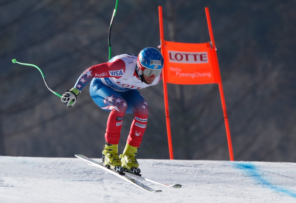 Steven Nyman of the United States is airborne during the first training session for a World Cup downhill as a test event of the Pyeongchang 2018 Winter Olympics at the Jeongseon Alpine Centre in Jeongseon, South Korea, Thursday, Feb. 4, 2016. (AP Photo/Lee Jin-man)