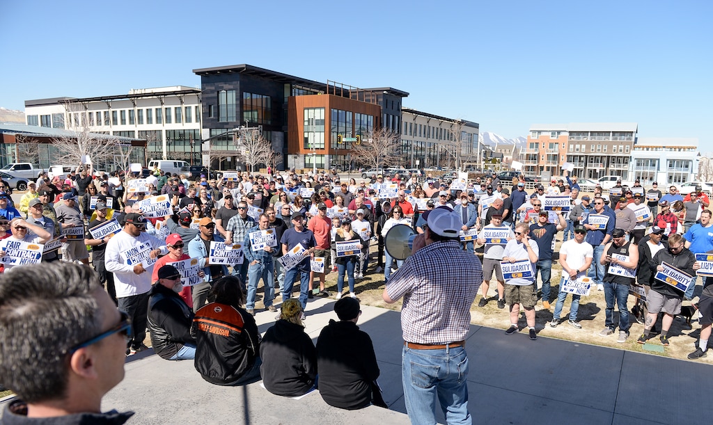 (Chris Samuels | The Salt Lake Tribune) Union officials lead Rio Tinto employees and supporters at a rally outside the company’s office in South Jordan, Friday, March 25, 2022, in support of a new contract.