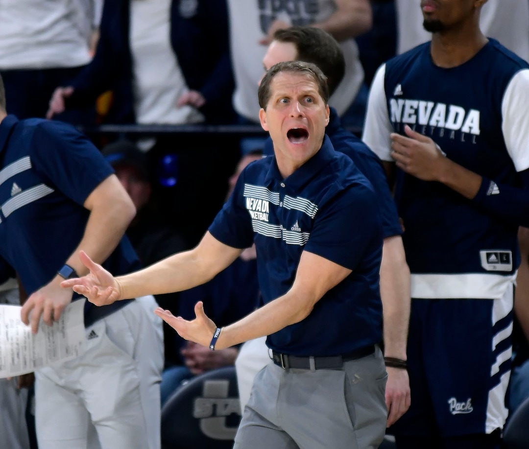 (Eli Lucero  |  The Herald Journal via AP) Nevada head coach Eric Musselman disagrees with a call during the team's NCAA college basketball game against Utah State on Saturday, March 2, 2019, in Logan, Utah.