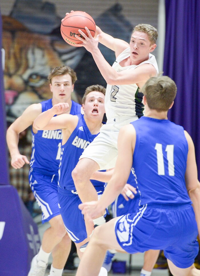 (Leah Hogsten  |  The Salt Lake Tribune) Copper Hills' Kylan Shorts (12) looks for the pass. Copper Hills defeated Bingham 61-54 in the 6A High School Boys' Basketball Tournament opening game at Weber State University’s Dee Events Center in Ogden, Tuesday, Feb. 27, 2018. 