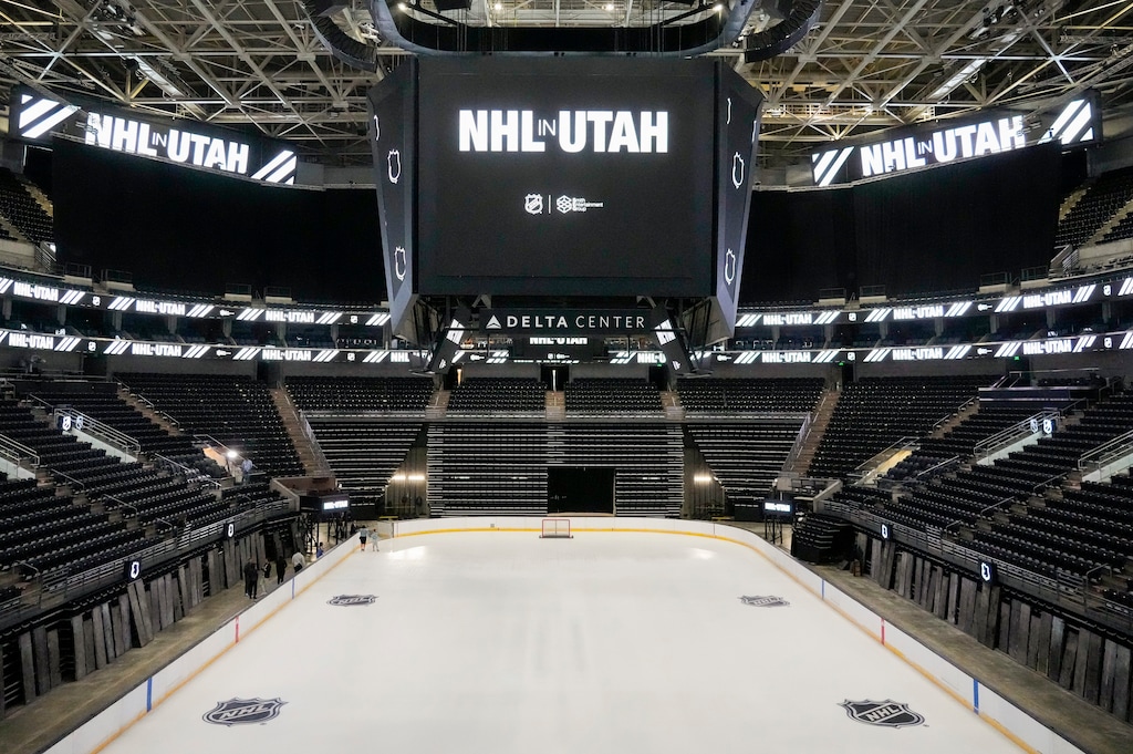 (Bethany Baker  |  The Salt Lake Tribune) People walk on the ice after a press conference announcing a new National Hockey League team owned by Smith Entertainment Group at the Delta Center in Salt Lake City on Friday, April 19, 2024.