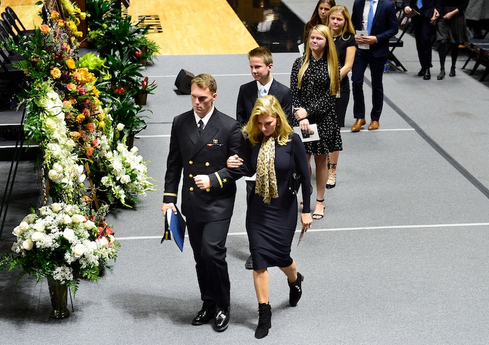Scott Sommerdorf | The Salt Lake Tribune
Mary Kay Huntsman leaves the services with her son at the conclusion of funeral services for Jon M. Huntsman, Sr., Saturday, February, 10, 2018. 
