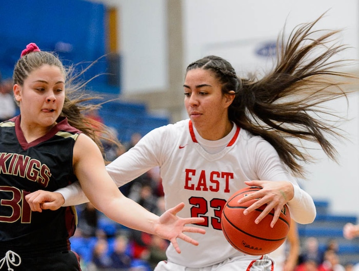 (Trent Nelson | The Salt Lake Tribune)  East's Liana Kaitu'u (23) drives on Viewmont's Madi Toole (31) as East faces Viewmont in the 5A High School Girls' Basketball Tournament at SLCC in Taylorsville, Wednesday Feb. 21, 2018.