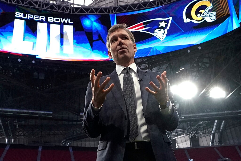 FILE - In this Jan. 29, 2019, file photo, NFL Chief Medical Officer Dr. Allen Sills gestures while speaking during a health and safety tour at Mercedes-Benz Stadium for the NFL Super Bowl 53 football game in Atlanta. Days after the NFL revealed its hopes of conducting a normal regular season and playoffs, its chief medical officer warns that nothing is a certainty during the coronavirus pandemic. Sills, a neurosurgeon who has been with the NFL since 2017, says he and other league and team medical personnel have been in constant communication with health officials throughout the country, looking at the same data they are using to make public recommendations. (AP Photo/David J. Phillip, File)