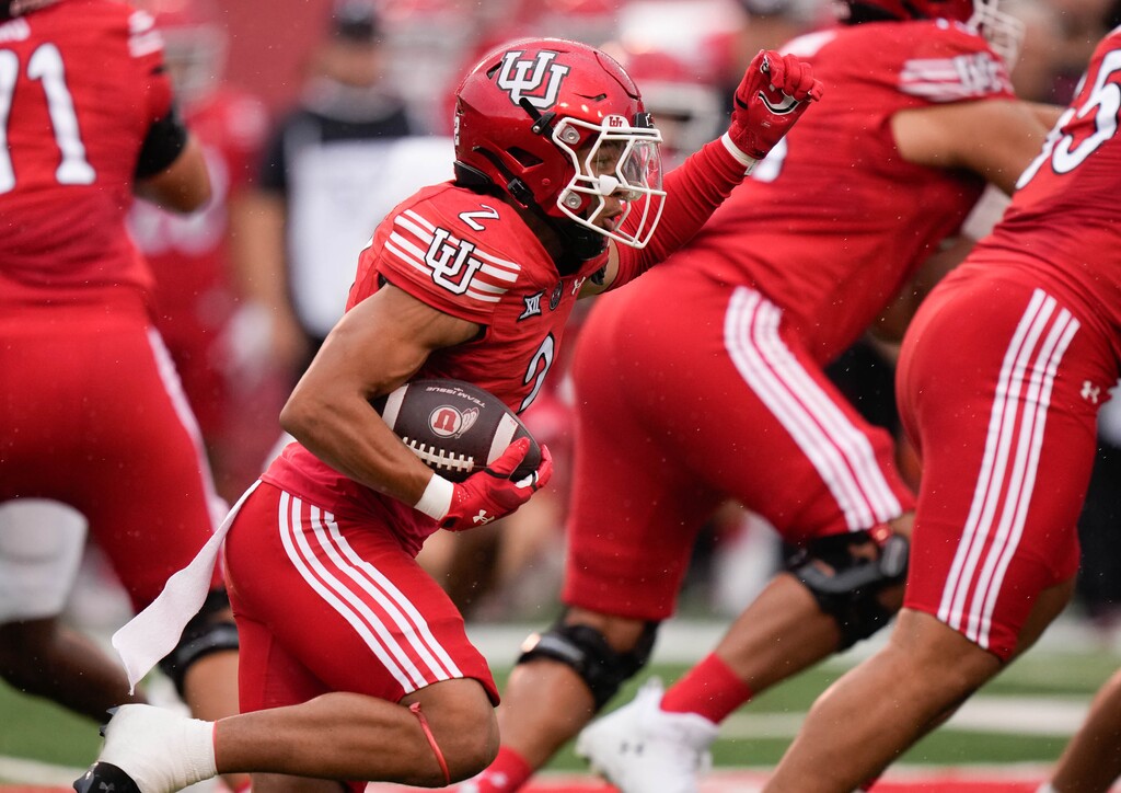 (Francisco Kjolseth | The Salt Lake Tribune) Utah Utes cornerback Smith Snowden (2) runs the ball as Utah hosts Cal Poly, NCAA football in Salt Lake City on Saturday, Sept. 6, 2025.