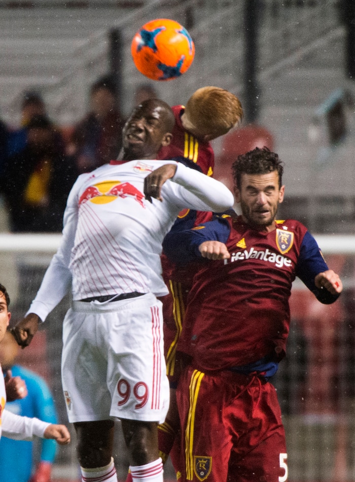 (Rick Egan  |  The Salt Lake Tribune)      Real Salt Lake defender Justen Glad (15) and midfielder Kyle Beckerman (5) go for the ball along with 
New York Red Bulls forward Bradley Wright-Phillips (99), in MLS action between Real Salt Lake and New York Red Bulls at Rio Tinto Stadium, Saturday, March 17, 2018.


