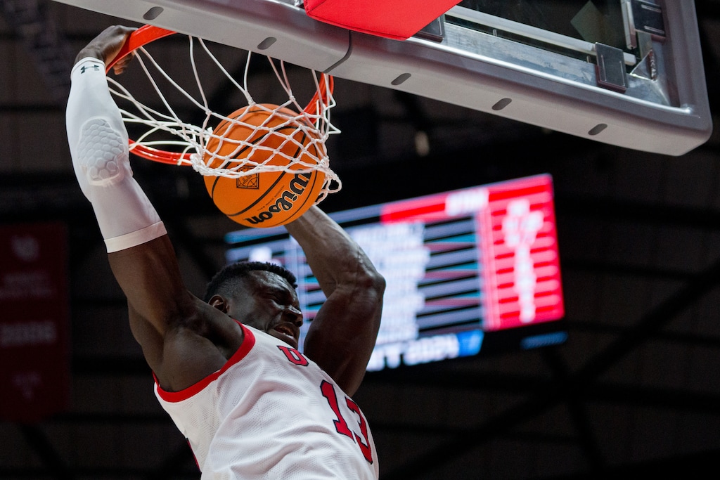 (Trent Nelson  |  The Salt Lake Tribune) Utah Utes center Keba Keita (13) dunks as Utah hosts Virginia Commonwealth in the NIT quarterfinals, NCAA basketball in Salt Lake City on Wednesday, March 27, 2024.
