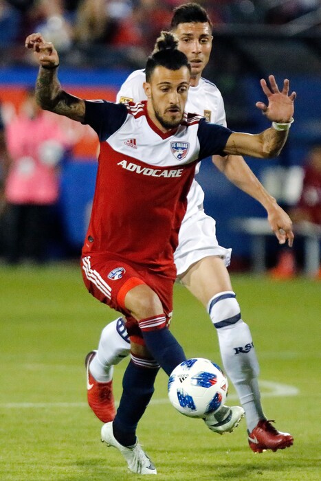 FC Dallas forward Maximiliano Urruti, front, controls the ball during the first half of an MLS soccer game against Real Salt Lake in Frisco, Texas, Saturday, March 3, 2018. (Stewart F. House/The Dallas Morning News via AP)