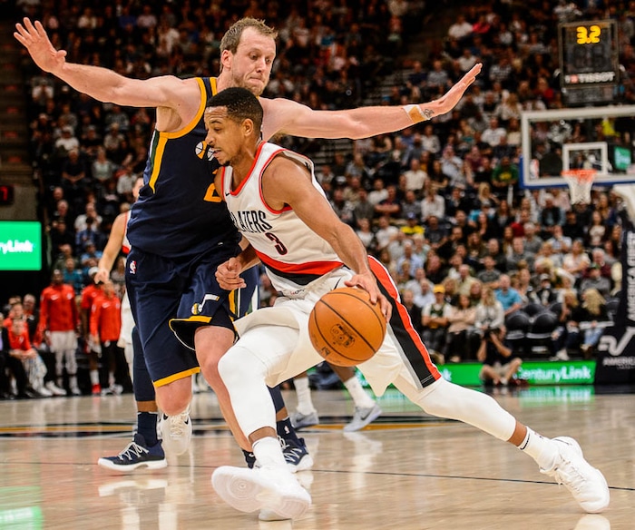 (Trent Nelson | The Salt Lake Tribune)  Portland Trail Blazers guard CJ McCollum (3) defended by Utah Jazz forward Joe Ingles (2) as the Utah Jazz host the Portland Trail Blazers, NBA basketball in Salt Lake City, Wednesday November 1, 2017.