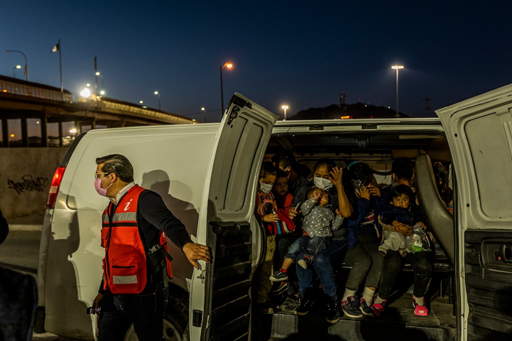 (Daniel Berehulak | The New York Times) Migrants deported from El Paso, Texas, are loaded into a van to be taken to a shelter, in Ciudad Juarez, Mexico, on Thursday, March 18, 2021.