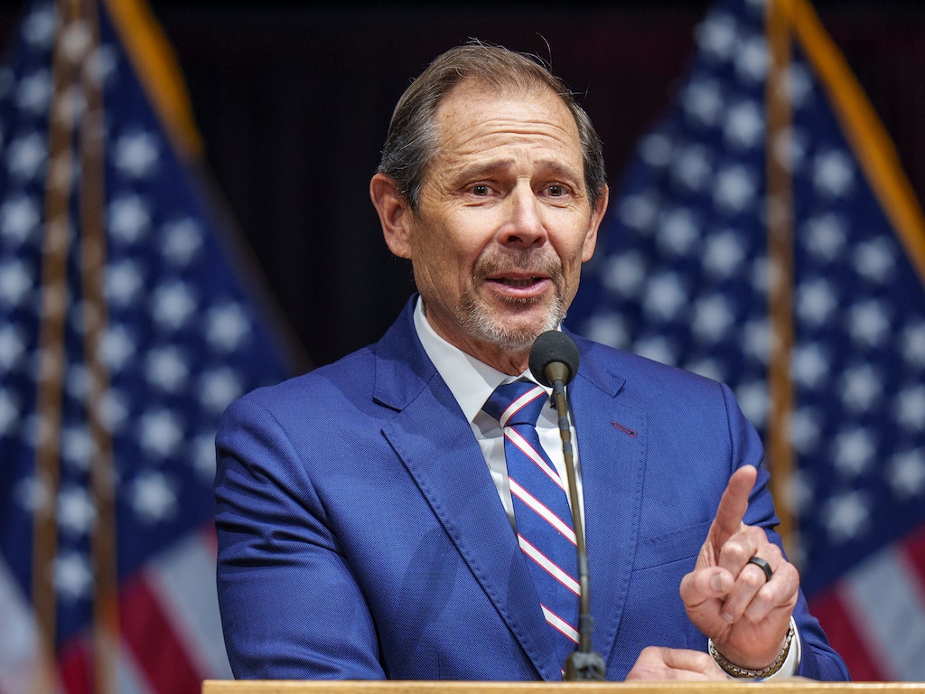 (Leah Hogsten | The Salt Lake Tribune) Utah Rep. John Curtis addresses the delegates at the Utah Republican Party 2023 Organizing Convention at Utah Valley University's UCCU Center on Saturday, April 22, 2023.