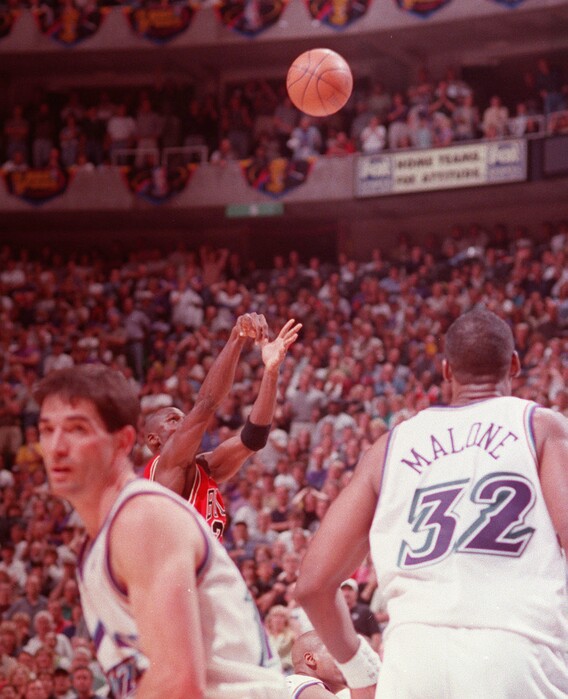 (Steve Griffin | Tribune file photo) Michael Jordan fires the game-winning shot in game six of the 1998 NBA Finals, giving the Bulls the NBA championship.