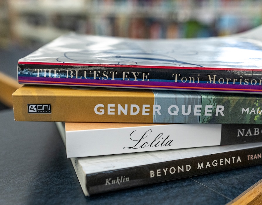(Leah Hogsten | The Salt Lake Tribune) Four of nine books that have been removed from schools in the Canyons School District and placed under review, Nov. 23, 2021. The Bluest Eye by Toni Morrison, Gender Queer by Maia Kobabe, Lolita by Vladimir Nabokov and Beyond Magenta by Susan Kuklin.