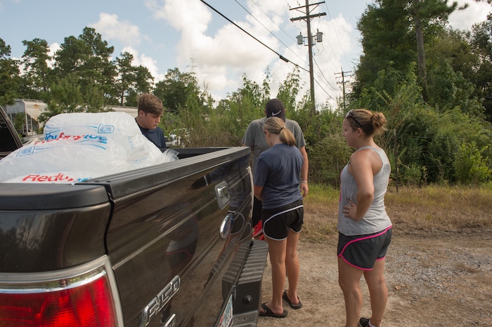 (Rachel Molenda  |  The Salt Lake Tribune)  Tonya Veazey, right, meets with her family while she works assesses flood damage in Rose City, Texas, on Tuesday, Sept. 5, 2017. Veazay is the city secretary and has been working nonstop since Hurricane Harvey hit the region last week, she said.
