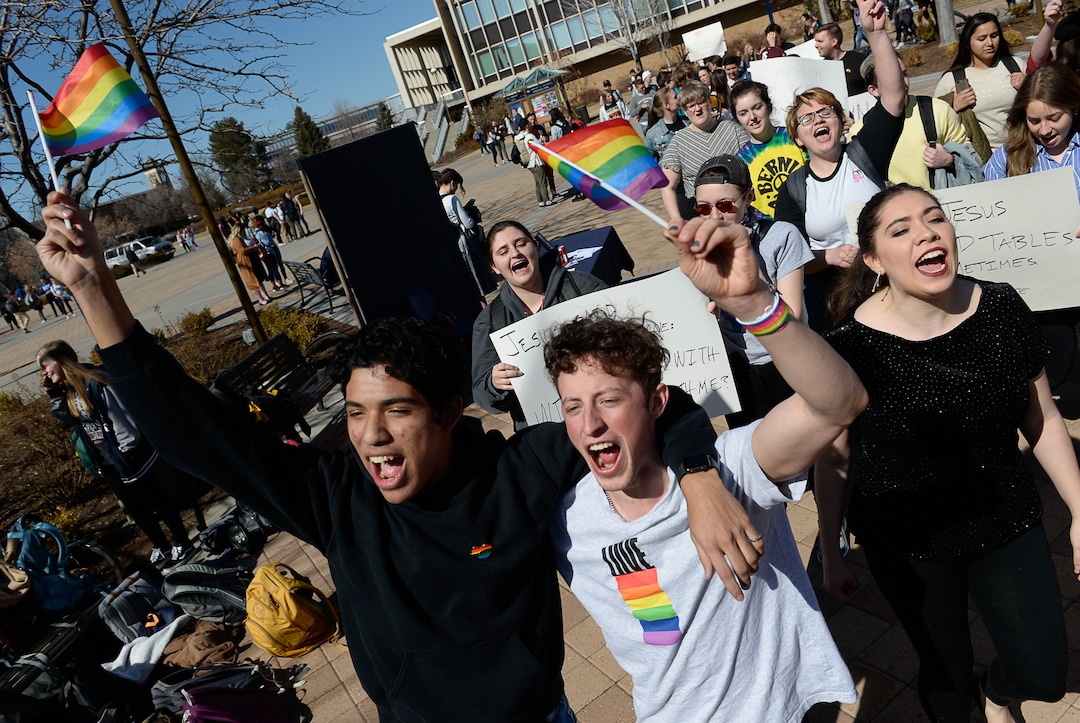 (Francisco Kjolseth  |  The Salt Lake Tribune) Lorenzo Larios, left, and Danny Niemann chant "gay rights" as they join the student protest outside the student center at Brigham Young University in Provo, Wednesday, March 4, 2020, after an official with The Church of Jesus Christ of Latter-day Saints issued a clarification to the school's Honor Code, which said that same-sex romantic behavior is still "not compatible" with the rules at BYU.