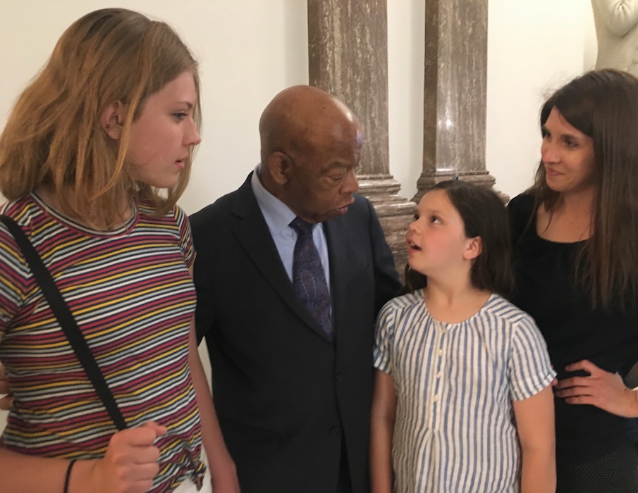 (Photo courtesy of Adelaide Parker) Adelaide Parker, left; U.S. Rep. John Lewis, D-Ga.; Adelaide's sister, Katherine Parker, and mother, Beth Parker. June 12, 2019, in the U.S. Capitol building in a hallway just off of the House floor.