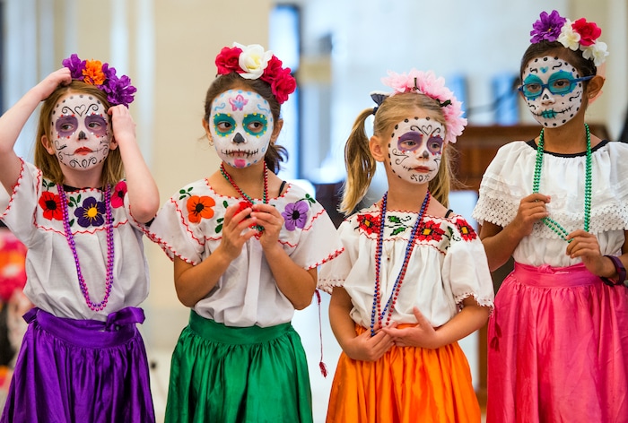 (Leah Hogsten | The Salt Lake Tribune) The Arte Primero dancers prepare to dance as part of the Day of the Dead festival Saturday, October 21, 2017 at the Capitol.