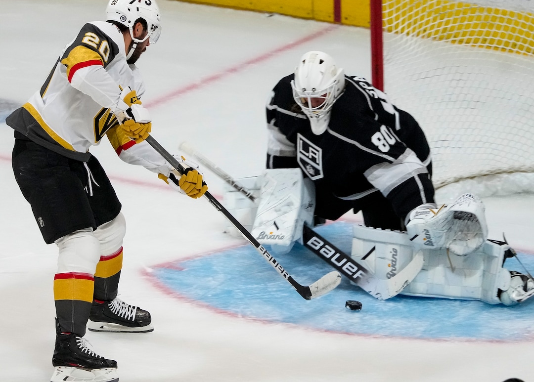 (Leah Hogsten | The Salt Lake Tribune) Los Angeles Kings goalie Garret Sparks (80) stops the shot of Vegas Golden Knights center Chandler Stephenson (20) as the Los Angeles Kings and Vegas Knights meet in a preseason game at Vivint Arena on Sept. 30, 2021.